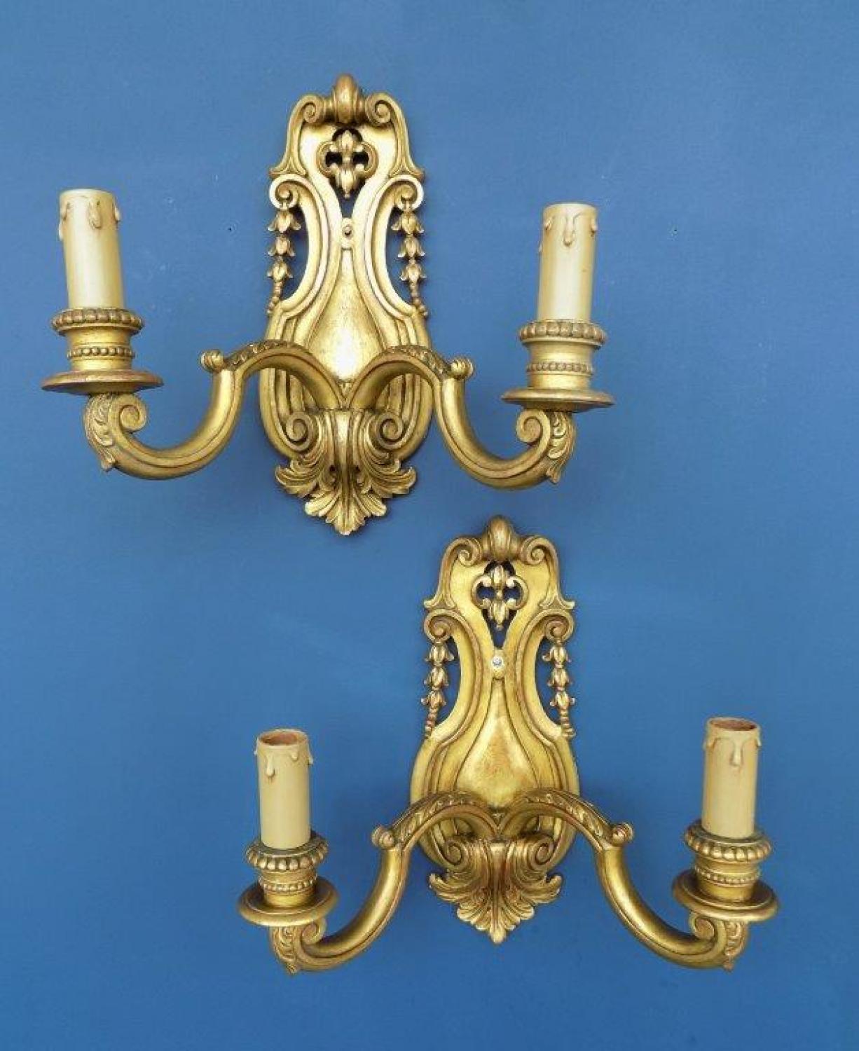 Pair of sconces, carved giltwood